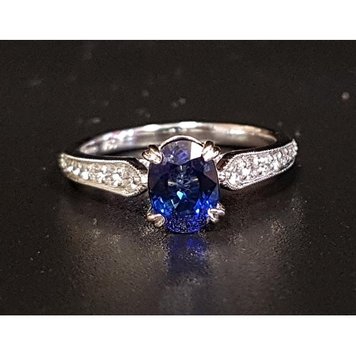 129 - SAPPHIRE AND DIAMOND RING
the oval cut sapphire approximately 0.8cts flanked by diamond set shoulder... 