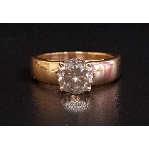 155 - FANCY DIAMOND SINGLE STONE RING
the round cut diamond approximately 2cts in unusual open side settin... 