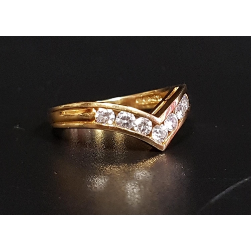 122 - DIAMOND SET WISHBONE RING
the seven channel set round brilliant cut diamonds totaling approximately ... 