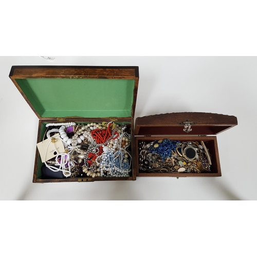 135 - TWO BOXES OF COSTUME JEWELLERY
including bead and other necklaces, bracelets, bangles, brooches, ear... 