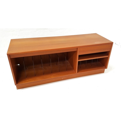 490 - TEAK MUSIC CABINET
with a moulded top above a short drawer with cassette divisions, above an open sh... 