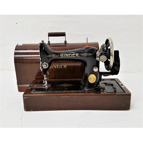 368 - VINTAGE SINGER SEWING MACHINE
with manual operation, model Y8913477, in a mahogany case