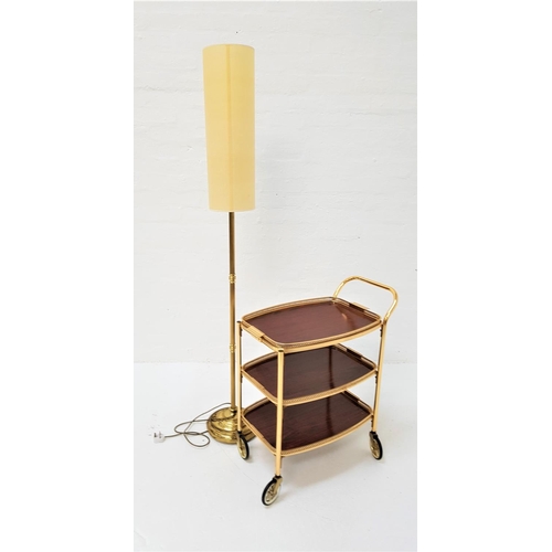 592 - GILT METAL HOSTESS TROLLEY
the three tier trolley with removable tray top; together with a brass sta... 