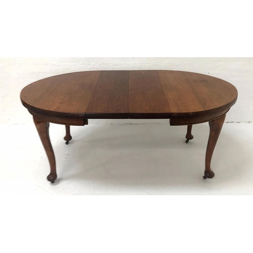 503 - EDWARDIAN OAK EXTENDING DINING TABLE
with D ends and two extra leaves with a wind out mechanism, sta... 