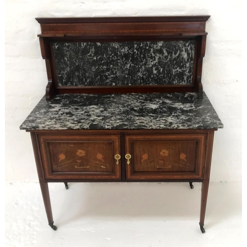 538 - ART NOUVEAU MAHOGANY AND INLAID WASH STAND
with a raised marble back and top above a pair of inlaid ... 