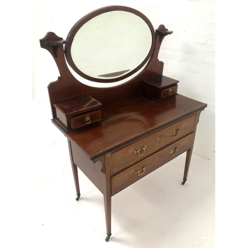 539 - ART NOUVEAU MAHOGANY AND INLAID DRESSING CHEST
with a bevelled oval mirror back above two jewellery ... 