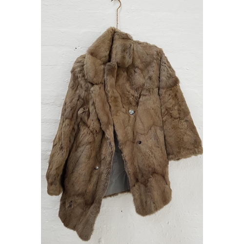 389 - FOUR FUR JACKETS
including a full length and a short rabbit jacket, a faux fur trimmed full length j... 