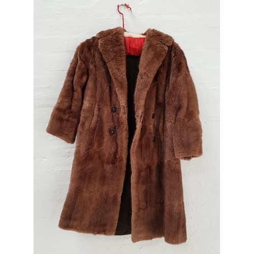 389 - FOUR FUR JACKETS
including a full length and a short rabbit jacket, a faux fur trimmed full length j... 