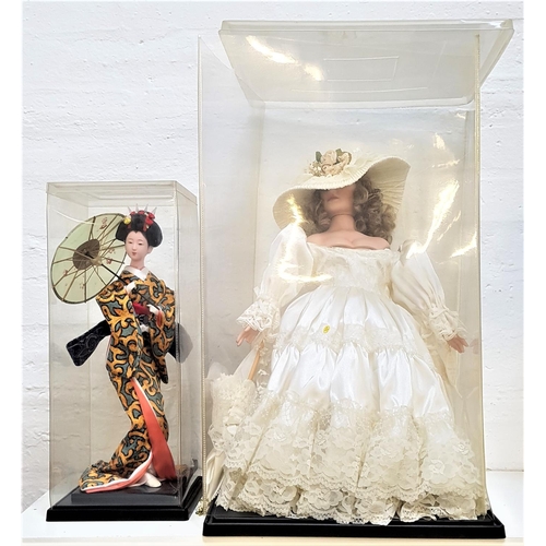 395 - LARGE COLLECTOR'S DOLL
Elizabeth by Alberon wearing a wedding dress and hat, boxed, 53.5cm high, and... 