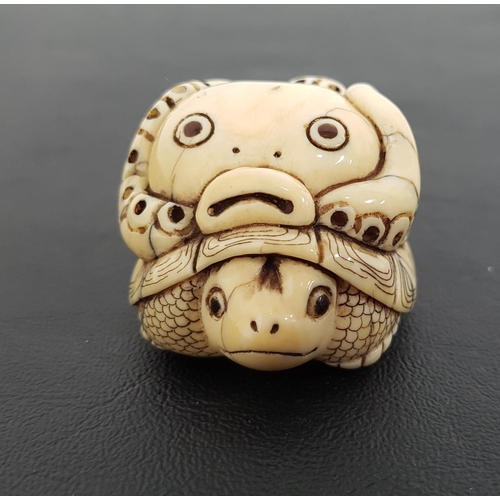 250 - IVORY NETSUKE
of a tortoise with an octopus on it's back, with character marks to base, 5.5cm long