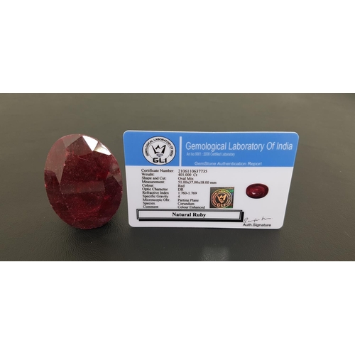 104 - LARGE CERTIFIED LOOSE NATURAL RUBY
the oval cut ruby weighing 401cts, with GLI Gemstone Authenticati... 
