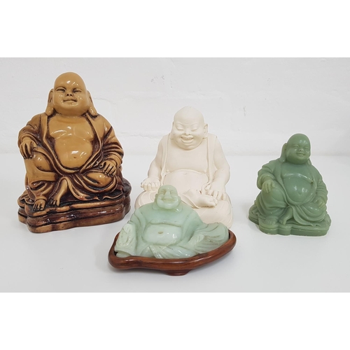 232 - FOUR FIGURES OF BUDDHA
with three in resin and one in soap stone (4)
