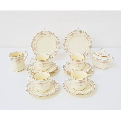 179 - NORITAKE TEA SERVICE
with a cream ground and floral motifs, comprising cups and saucers, side plates... 