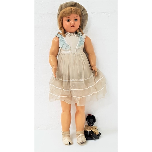 302 - VINTAGE BRITISH CHILD'S DOLL
with sleeping eyes, blonde hair, jointed wood and composition limbs, 92... 