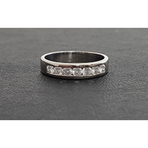 88 - DIAMOND SEVEN STONE RING
the channel set round brilliant cut diamonds totaling approximately 0.35cts... 