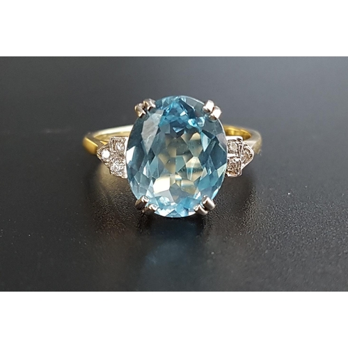 17 - BLUE TOPAZ AND DIAMOND RING
the central oval cut blue topaz approximately 4cts, flanked by three sma... 