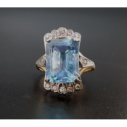 45 - IMPRESSIVE BLUE TOPAZ AND DIAMOND COCKTAIL RING
the large emerald cut blue topaz measuring approxima... 