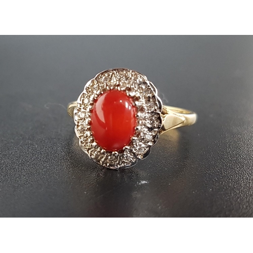 75 - CORAL AND DIAMOND CLUSTER RING
the central oval cabochon coral stone in diamond surround, on nine ca... 