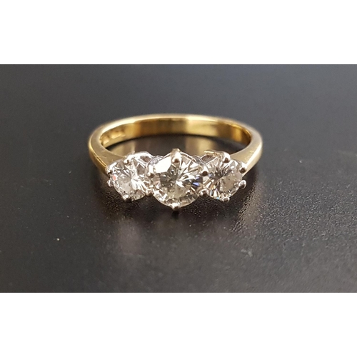 86 - MOISSANITE THREE STONE RING
the graduated moissanites totaling approximately 0.75cts, on eighteen ca... 