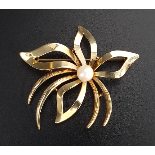 138 - PEARL SET NINE CARAT GOLD BROOCH
the central pearl in pierced floral design setting, total weight ap... 
