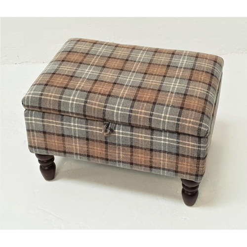 415 - SHETLAND STORAGE STOOL
covered in tartan with a padded lift up lid, standing on turned supports, 66c... 