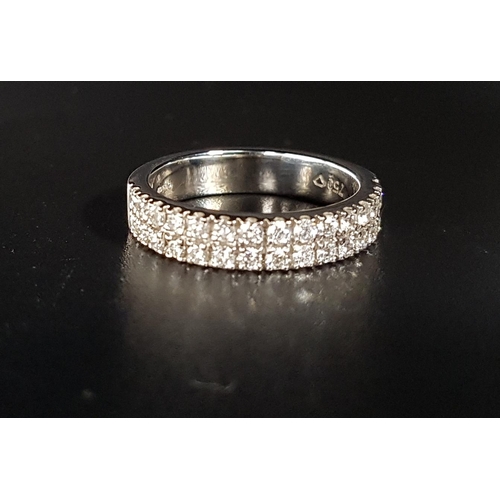 66 - DIAMOND TWO ROW HALF ETERNITY RING
the diamonds totaling approximately 0.65cts, in eighteen carat wh... 