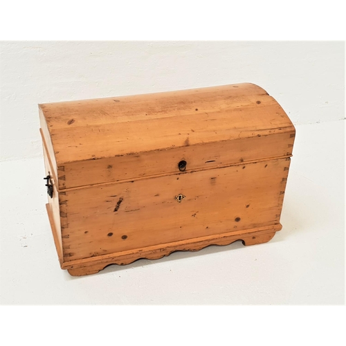 465 - 19th CENTURY DOME TOP TRUNK
with a lift up lid and side carrying handles, standing on stout shaped s... 