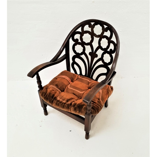 469 - BENTWOOD ARMCHAIR
with an arched shaped back with pierced decoration above swept arms with turned co... 