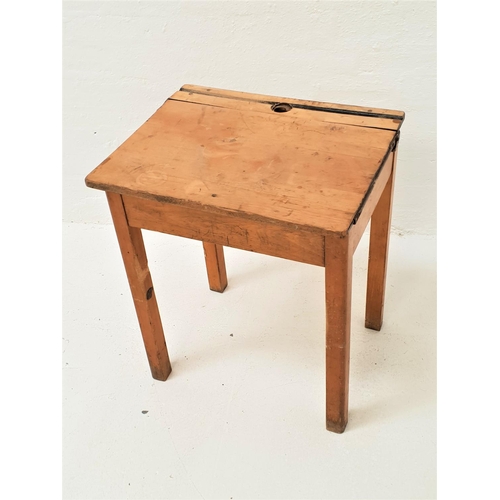 472 - CHILDS BEECH SCHOOL DESK
with a central inkwell recess and pen trough and lift up lid, standing on s... 