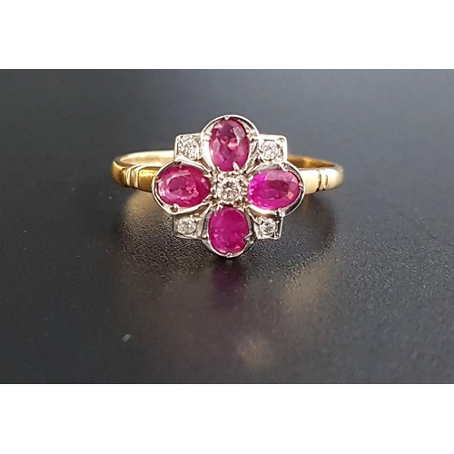 32 - RUBY AND DIAMOND CLUSTER RING
the four oval cut rubies separated by small diamonds, on nine carat go... 