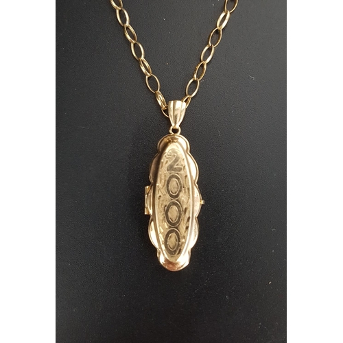 36 - NINE CARAT GOLD LOCKET PENDANT AND CHAIN
the oval locket engraved '2000', on belcher link chain meas... 