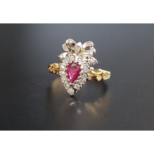 64 - UNUSUAL RUBY AND DIAMOND CLUSTER RING
the pear cut ruby in diamond surround and surmounted by a diam... 