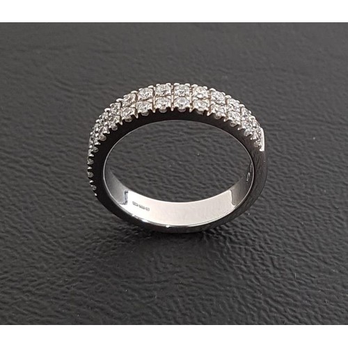 66 - DIAMOND TWO ROW HALF ETERNITY RING
the diamonds totaling approximately 0.65cts, in eighteen carat wh... 