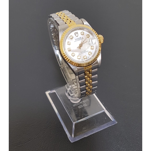 84 - LADIES TUDOR PRINCESS DATE WRIST WATCH
the circular mother of pearl dial with diamond hour markers, ... 