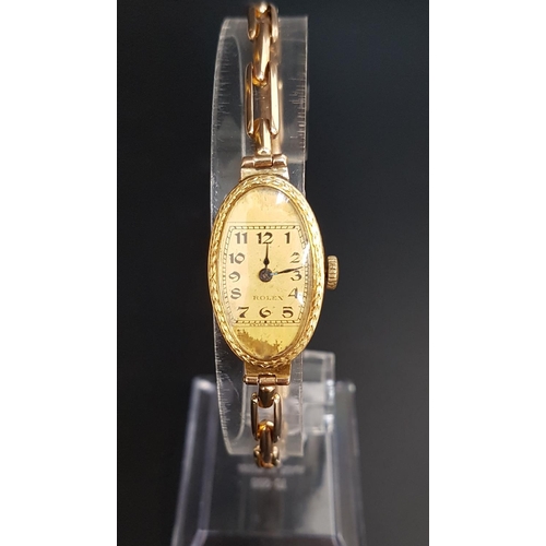 91 - LADIES EIGHTEEN CARAT GOLD CASED ROLEX WRISTWATCH
the oval dial with Arabic numerals, on nine carat ... 