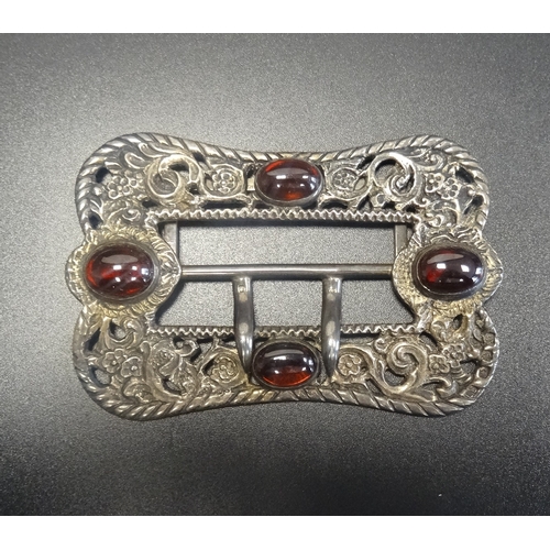 178 - LATE VICTORIAN SILVER BELT BUCKLE
with cabochon set stones to the decorative pierced and scrolled bu... 