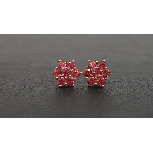 5 - PINK TOURMALINE CLUSTER EARRINGS
the fourteen round cut gemstones totaling approximately 2.4cts, in ... 