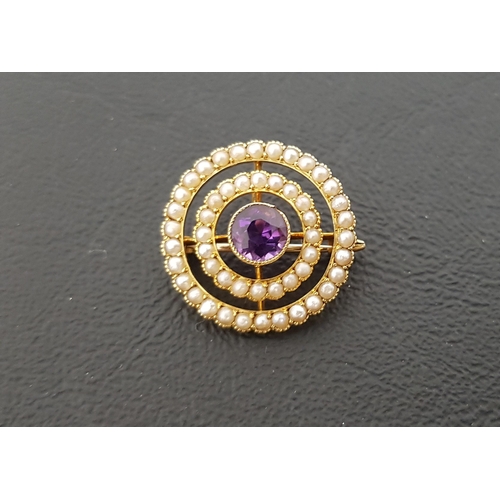 41 - EDWARDIAN MURRLE BENNETT & CO. AMETHYST AND SEED PEARL BROOCH/ PENDANT
in fifteen carat gold, the ce... 