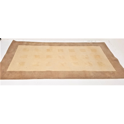 488 - LARGE RUG
the camel and cream ground with square motifs to the central section, 323cm x 172cm