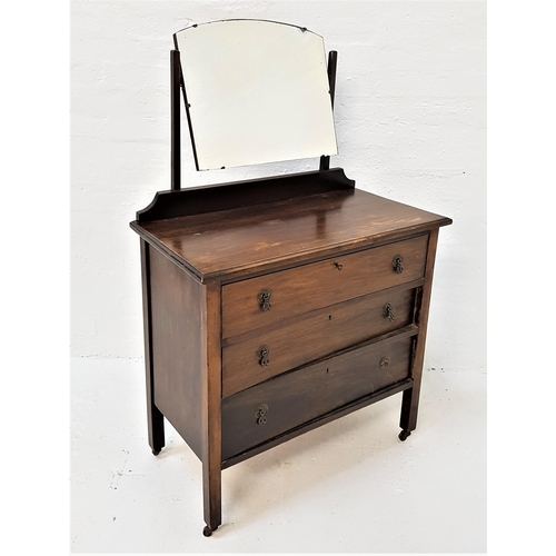 492 - WALNUT DRESSING CHEST
the shaped bevelled mirror above a moulded top with three drawers below, 84cm ... 