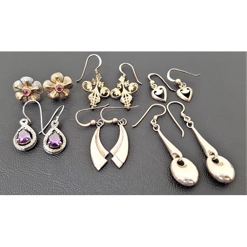 26 - SIX PAIRS OF SILVER EARRINGS
including a pair of purple CZ set drop earrings, a pair of cabochon gem... 