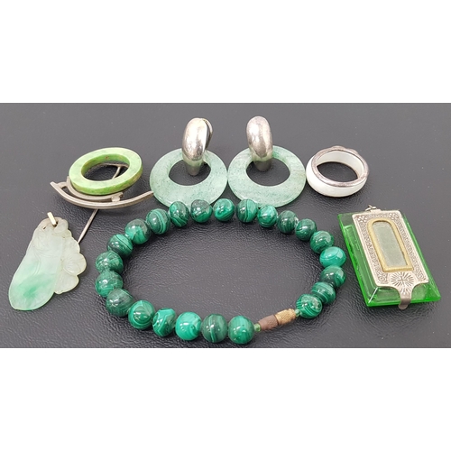 78 - SELECTION OF JADE AND OTHER JEWELLERY
comprising a carved jade pendant in the form of fruit and foli... 