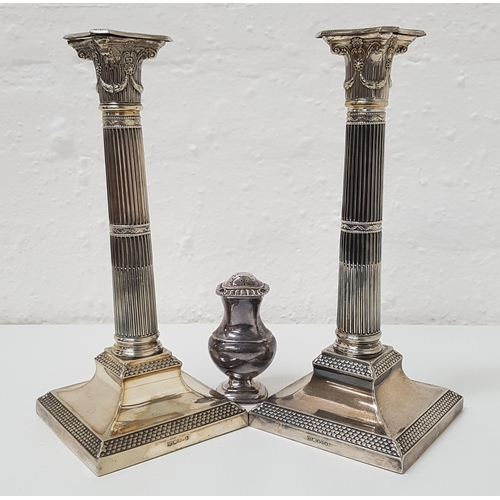 177 - PAIR OF SILVER PLATED COLUMN CANDLESTICKS
with decorative capitals and fluted columns, by Henry Wilk... 