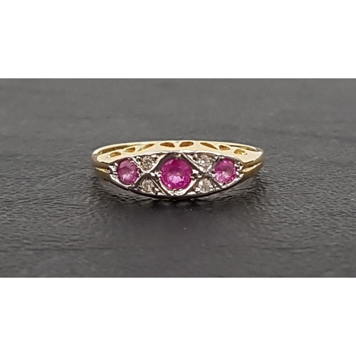 39 - RUBY AND DIAMOND RING
the three graduated rubies separated by small diamonds, on eighteen carat gold... 
