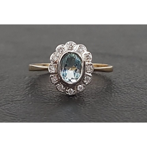 94 - AQUAMARINE AND DIAMOND CLUSTER RING
the oval cut aquamarine in twelve diamond surround, on nine cara... 