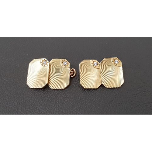 10 - PAIR OF WHITE SAPPHIRE SET NINE CARAT GOLD CUFFLINKS
with engraved detail and a white sapphire to th... 