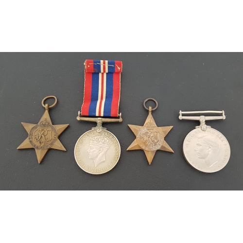 355 - GROUP OF FOUR WWII MEDALS
including The Africa Star, The 1939-1945 Star, The War Medal and ribbon an... 