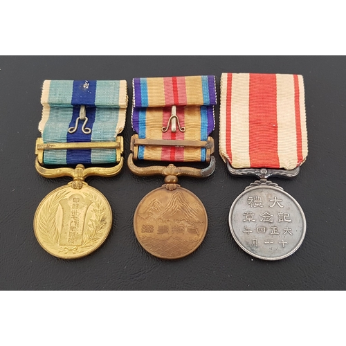 358 - THREE JAPANESE WAR MEDALS
including The 1937-45 China Incident War Medal, 1904/1905 Russo-Japanese W... 