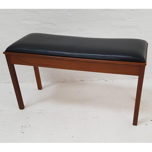 541 - TEAK DUET PIANO STOOL
with a padded lift up seat, standing on plain supports, 94cm wide