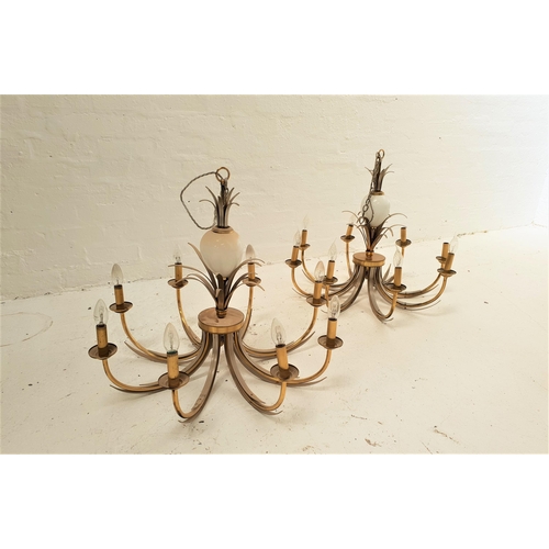 510 - PAIR OF GILT BRASS AND METAL PINEAPPLE STYLE CHANDELIERS
the opaque glass body with gilt brass folia... 